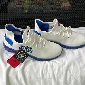 Brand new men’s size 11 Chicago Cubs athletic shoes.